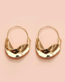 Gold wavy hoop earrings